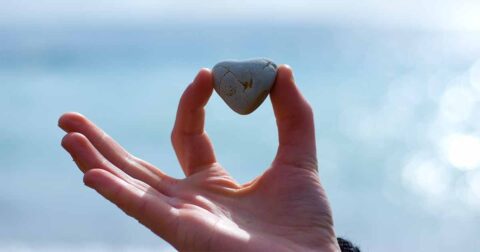 The Power of Forgiveness: How it can help care partners image of a heart shaped rock